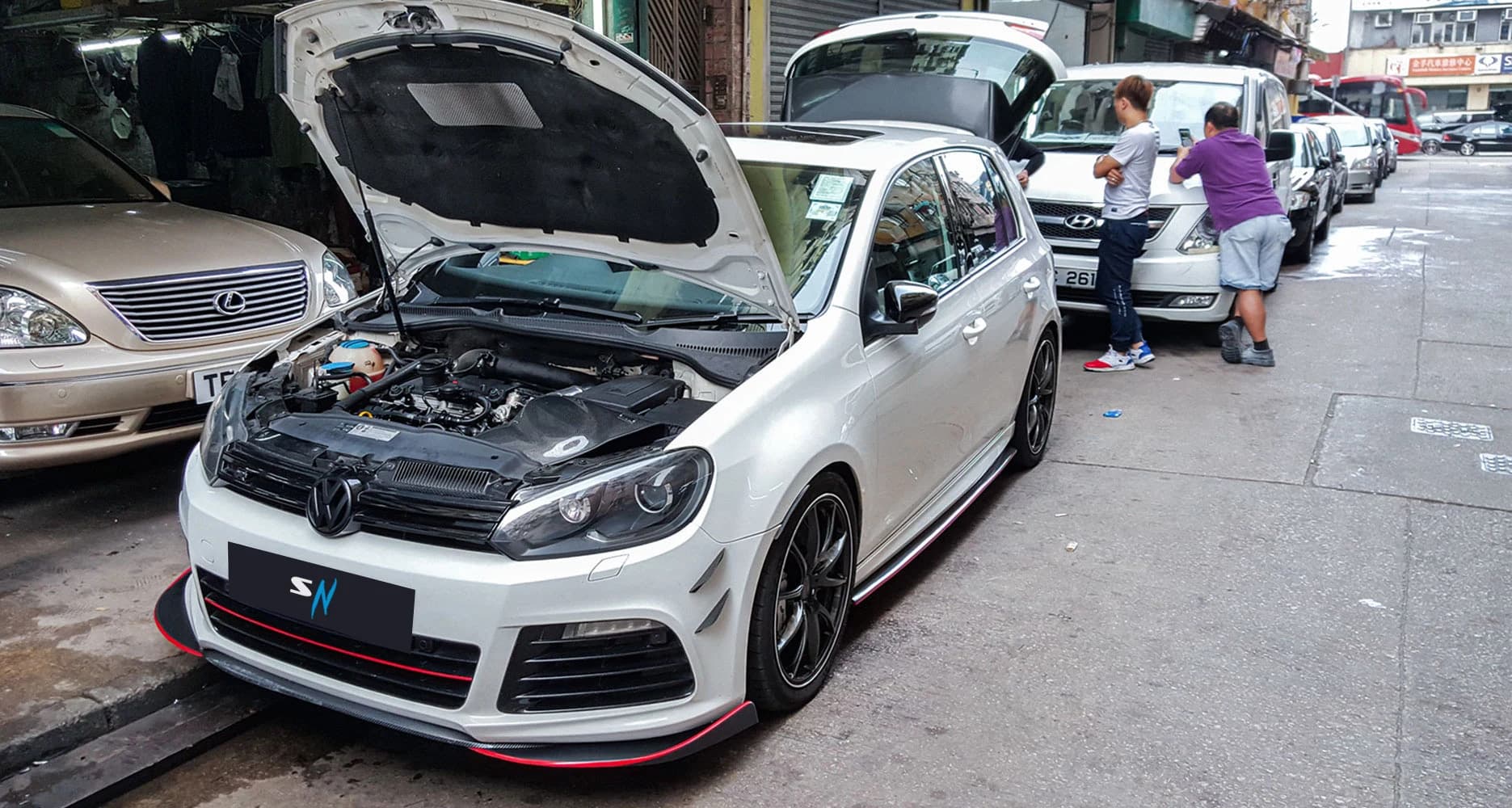 Volkswagen Golf R MK6 exterior getting ready for oil service with supernano 5w30 motor oil with engine hood up